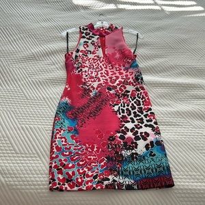 Bebe multi colored mini dress. Size medium.